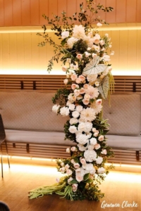 Floral arbour at wedding ceremony