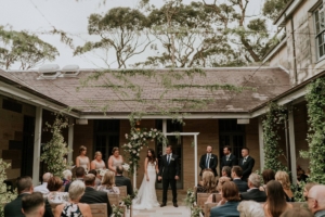 Wedding Ceremony inside the Sandstone Courtyard at Gunners