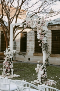 Soft and romantic wedding arch at ceremony