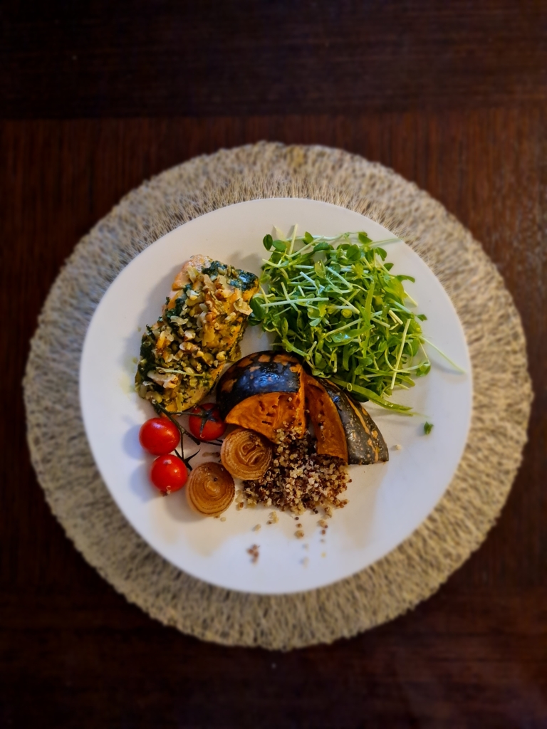 Rocket and walnut pesto salmon with roasted cherry tomatoes, pumpkin and onion, snow peas and quinoa salad. Yes Chef.