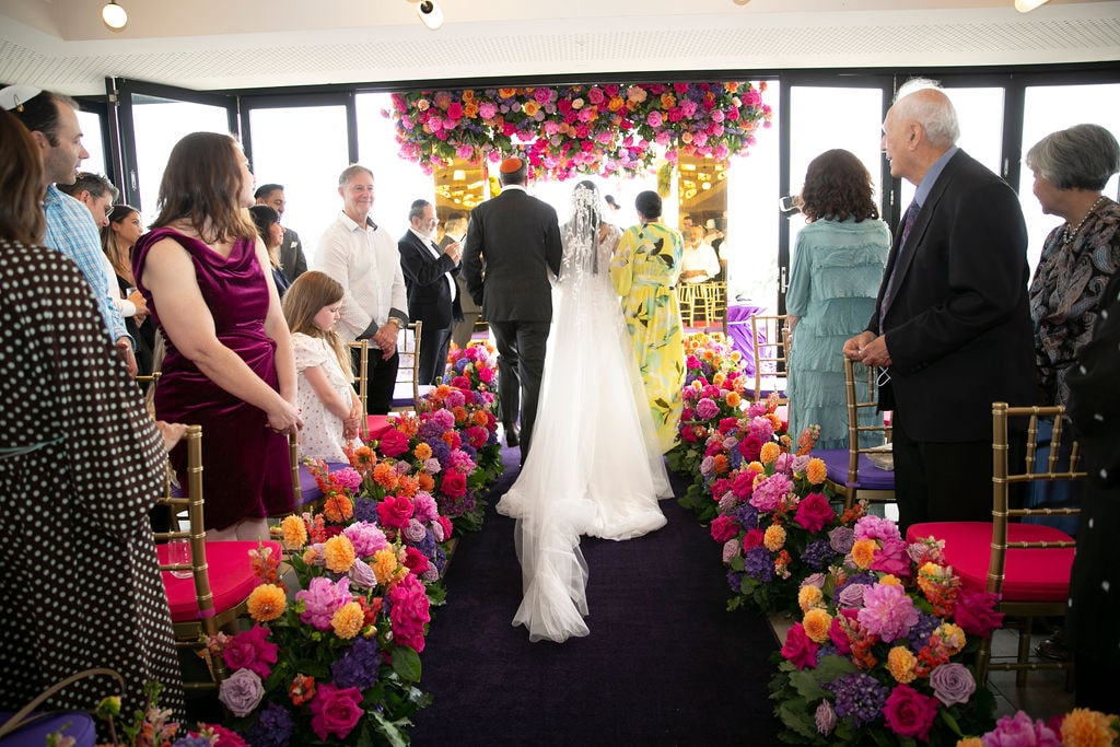 And after much anticipation, Harleen walks down the aisle. Image Blumenthal Photography.