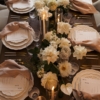 Gold Taper holder with sleeve tablescape